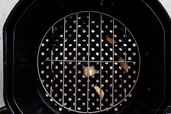 preheating air fryer with garlic | www.iamafoodblog.com