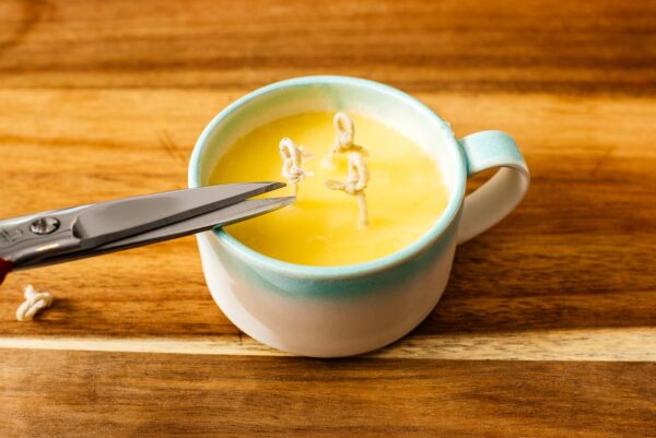 trimming wick of butter candle | www.iamafoodblog.com