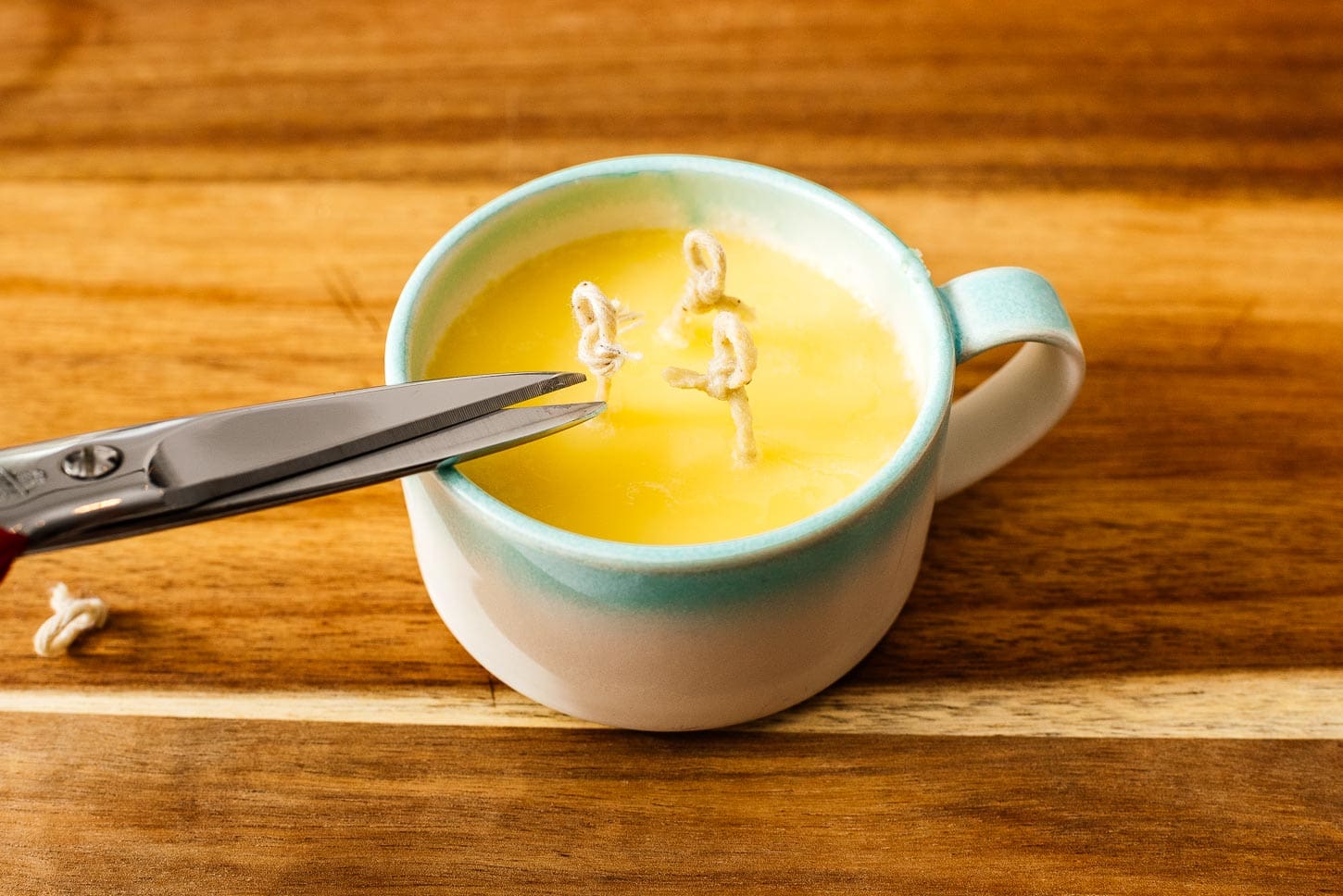 trimming wick of butter candle | www.iamafoodblog.com