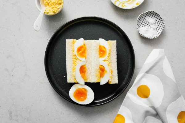 Japanese-style egg salad sandwiches! Do you love egg salad sandwiches but want a twist? Creamy kewpie mayo and jammy eggs makes this sandwich a winner. Just like the sandwiches you had on vacation in Japan but better ;) #sandwiches #eggsalad #japanese #japanesefood #recipes #recipeoftheday #eggs