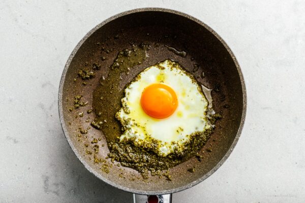 frying egg in pesto | www.iamafoodblog.com