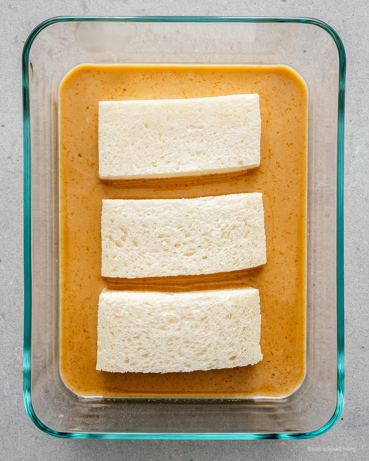 This Japanese tamagoyaki-inspired french toast is soft and custardy on the inside and crisp on the outside. The perfect combination of sweet and savory! | www.iamafoodblog.com