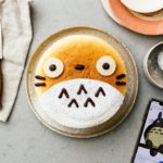 A super cute fluffy, jiggly Totoro cheesecake: pillowy soft, cotton-y, light-as-air cheesecake with just a hint of sweetness. #cheesecake #japanesecheesecake #fluffycheesecake #totorocake #totorocheesecake #totorofood #kawaiifood